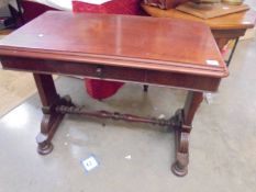 A Victorian mahogany side table on stretcher base, COLLECT ONLY.