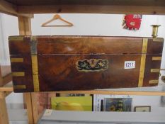 A brass bound mahogany box. no interior.