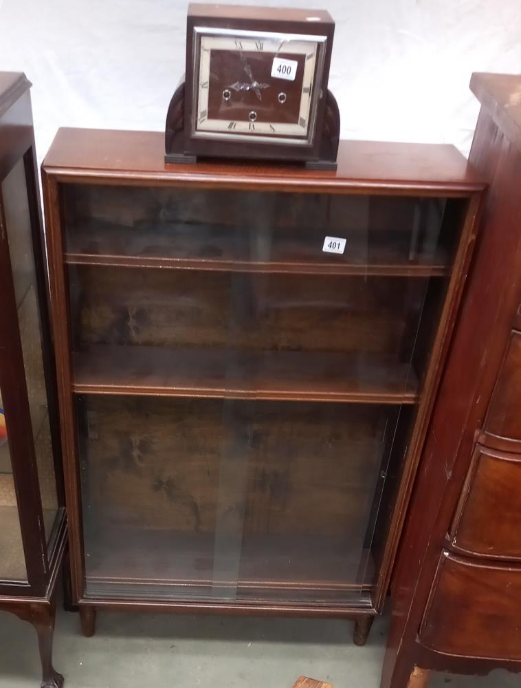 A 1950's oak book case with sliding doors COLLECT ONLY