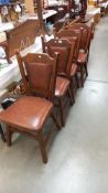 A set of 4 arts and crafts oak dining chairs