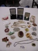 A mixed lot of good quality brooches, pearl necklaces etc.,