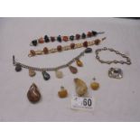 A mixed lot of natural stone bracelets, pendants and earrings etc.,