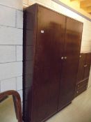 A Stag style mahogany effect wardrobe. COLLECT ONLY.