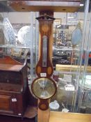 A mahogany inlaid barometer/thermometer. COLLECT ONLY.
