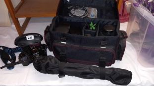 A Minolta X-9 35mm and Minolta X-300 cameras with lenses carry case and tripod