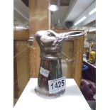 A silver plate stirrup cup featuring a hare head.