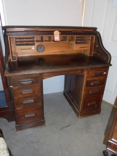 An early 20th century roll top desk, COLLECT ONLY