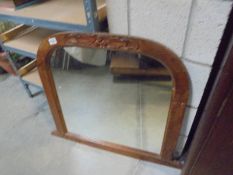 An arched overmantel mirror, COLLECT ONLY.