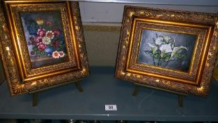 A pair of ormalu gilt framed prints