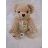 A Merrythought 'Royal Mail Stamp' bear.