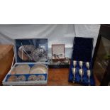 A boxed set of Cavalier silver plated coasters, goblets set, boxed cutlery etc