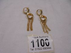 A pair of 9ct gold earrings, size 4.2 grams.