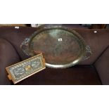 A large Eastern brass tray with coloured infilled engraved top and an inlaid tray, possibly made
