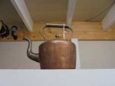 An old copper kettle.