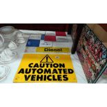 3 vintage warning signs including caution automated vehicles etc