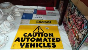 3 vintage warning signs including caution automated vehicles etc