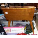 A retro teak sewing box