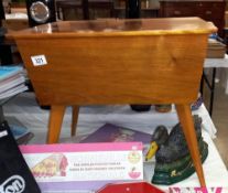 A retro teak sewing box