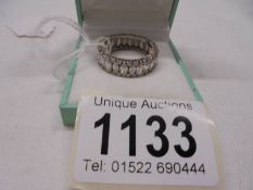 A silver full eternity ring, size Q.