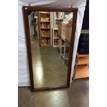 A late 19c early 20c barbers shop mirror in heavy oak frame, some foxing to mirror COLLECT ONLY