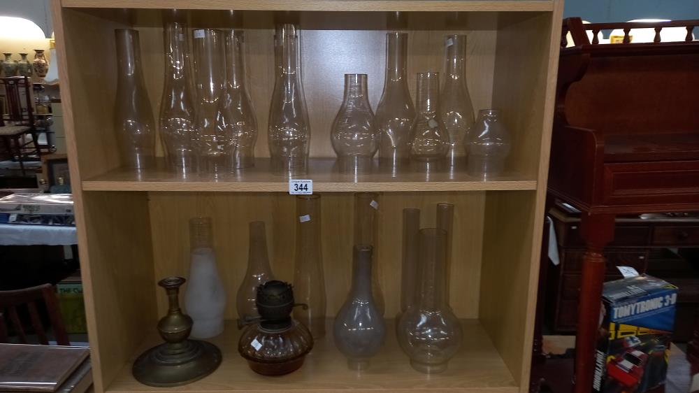 A quantity of Victorian oil lamp parts & chimneys