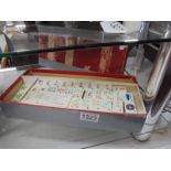 A good boxed Mahjong set.