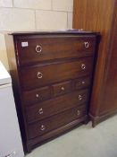 A Stag style mahogany effect chest of drawers. COLLECT ONLY.