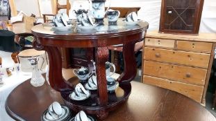 A dark wood stained round coffee table with bevel glass top Diameter 71cm, height 58cm COLLECT ONLY