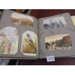 A good Edwardian photo album with postcards.