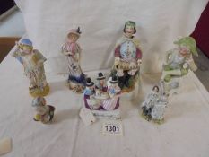 A mixed lot of figures including a nodding medieval king, Welsh teaparty etc.,