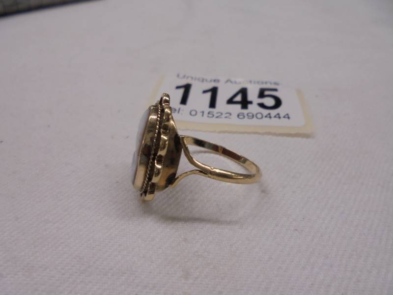 A cameo ring of a female profile dated 1973, hallmarked 9ct gold, size O, 2.6 grams. - Image 2 of 2