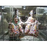 A pair of Chinese Diety figures, COLLECT ONLY.