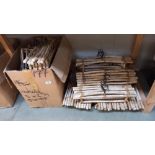 A large quantity of shabby chic/flintstones style wooden coat hangers COLLECT ONLY