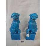 A pair of blue ceramic Chinese Dogs of Fo.