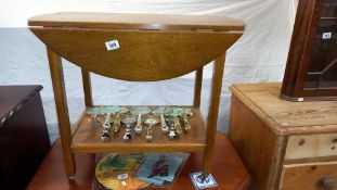 An oak drop leaf tea trolley / coffee table - COLLECT ONLY