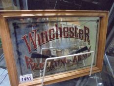 A Winchester Repeating Arms advertising mirror. COLLECT ONLY.