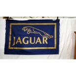 A vintage Jaguar main dealers flag/banner 70cm x 46cm