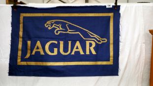 A vintage Jaguar main dealers flag/banner 70cm x 46cm