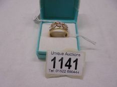 An 18ct gold ring set clear stones, size S, 5.2 grams.