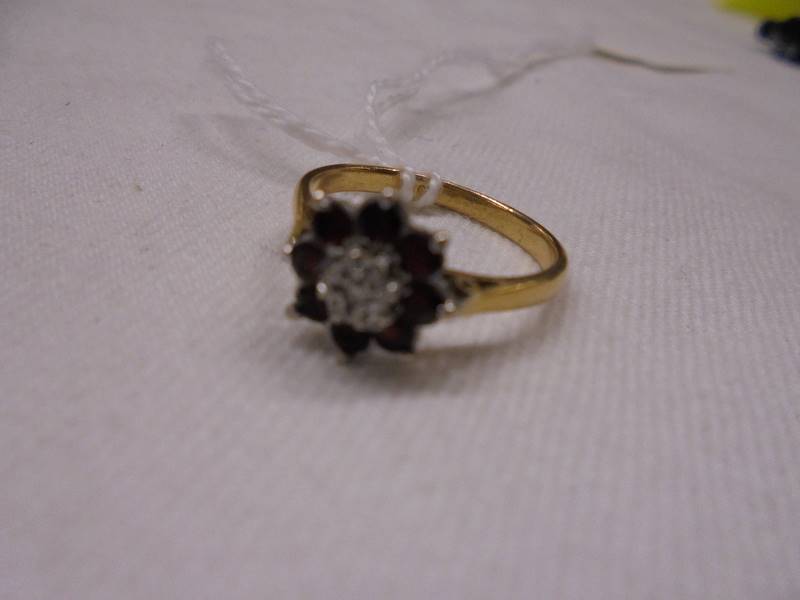 An 18ct gold cluster ring, size M, 2.9 grams. - Image 2 of 2