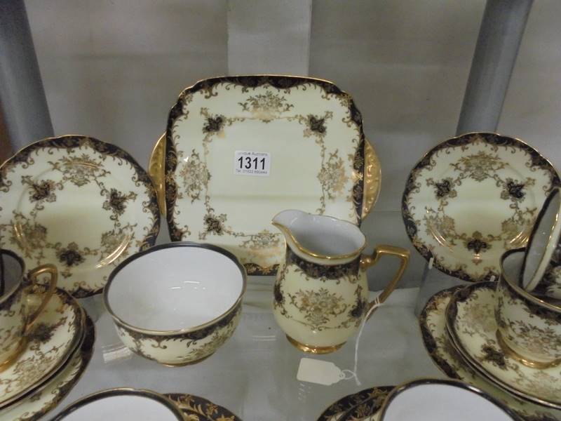 A pretty 21 piece porcelain tea set, COLLECT ONLY. - Image 2 of 2