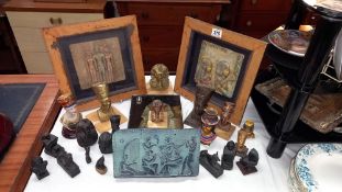 A quantity of Egyptian revival ornaments including framed plaques