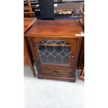 A dark oak display cabinet with leaded glass door, COLLECT ONLY