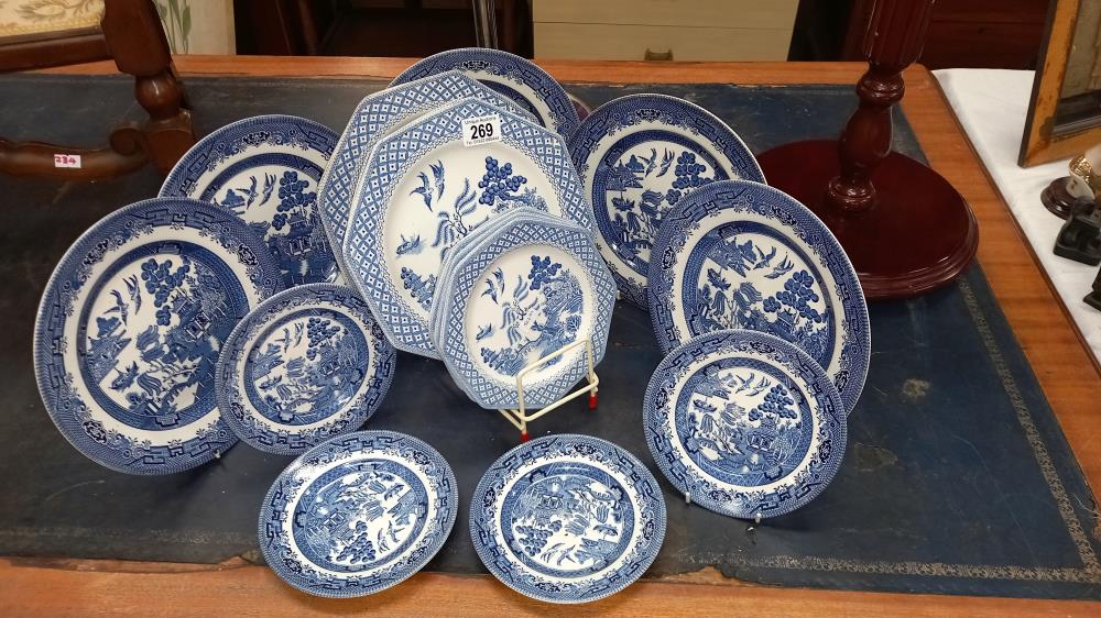 A quantity of blue and white willow china plus Churchill and Royal Staffordshire