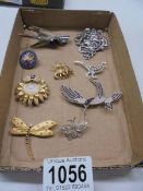 A mixed lot of brooches including micro mosaic, animal related etc.,