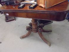 A Victorian mahogany fold over table, COLLECT ONLY.