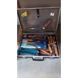 A case of wooden chisels etc