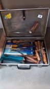 A case of wooden chisels etc