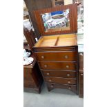 A 1950's gents oak bedroom chest of drawers with lift up mirror backed lid COLLECT ONLY