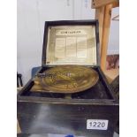 A Victorian symphonium musical box with eleven 5.75" discs.